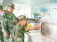 德江县民族中医院免费为武警中队进行免费健康体检